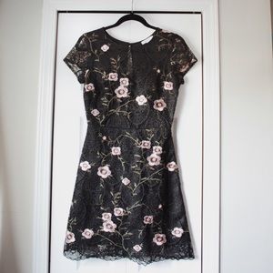 Black dress with floral embroidery